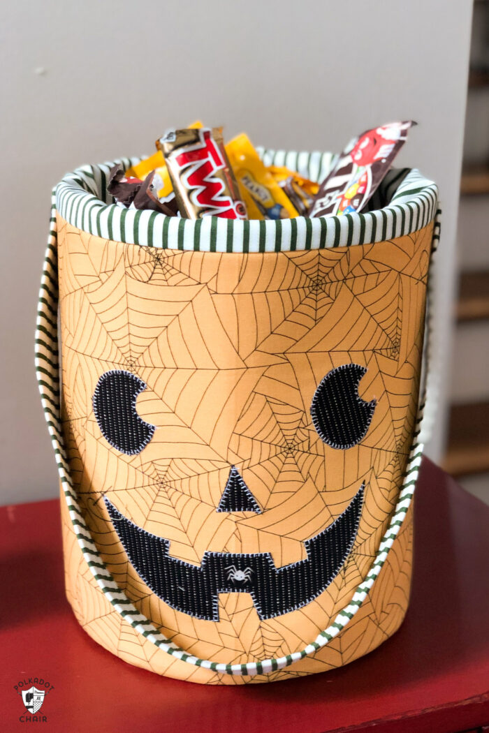 https://www.polkadotchair.com/wp-content/uploads/2019/09/cute-halloween-candy-bucket-sewing-pattern-700x1050.jpg