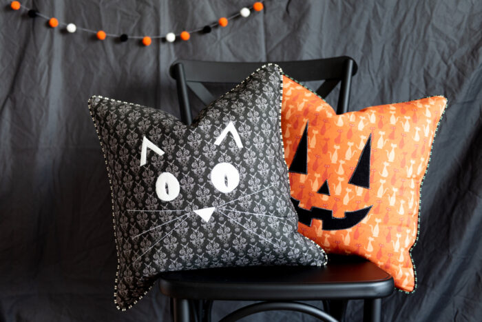 https://www.polkadotchair.com/wp-content/uploads/2020/10/halloween-pillow-with-pumpkin-700x467.jpg