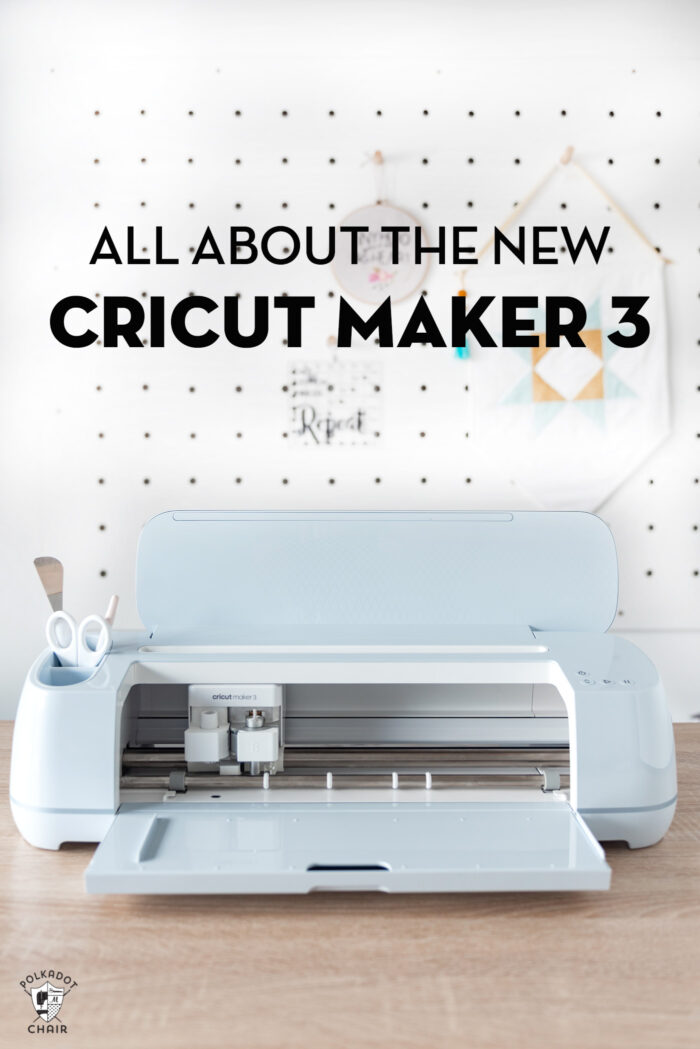 new cricut maker 3 machine on wood table in front of white wall