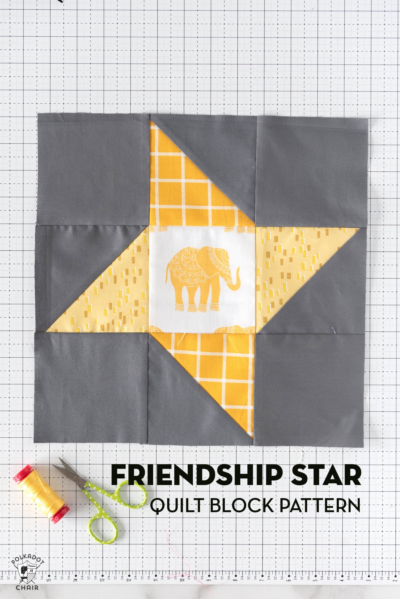 yellow and gray quilt block on white cutting mat