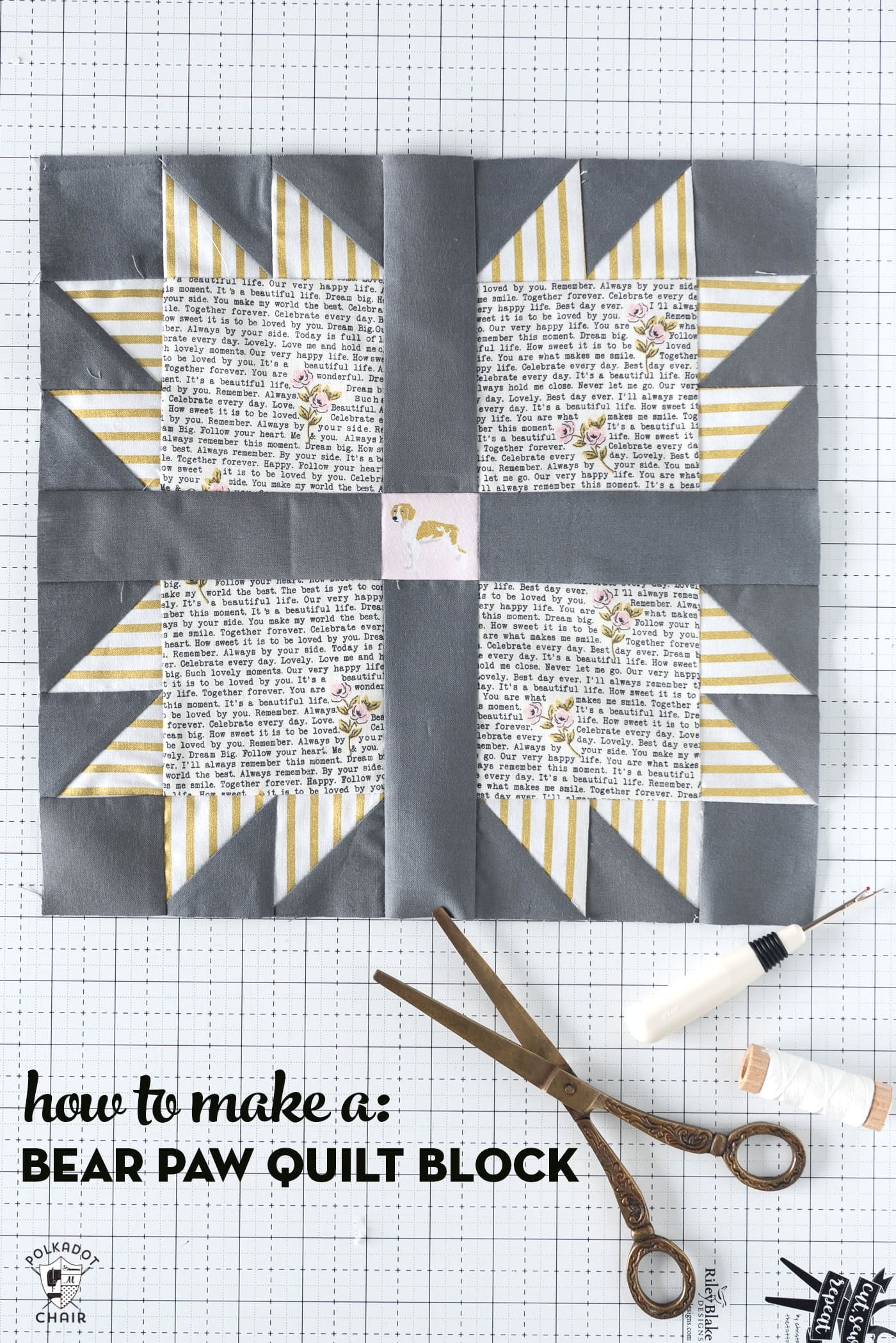 gray and ivory bear paw quilt block on white cutting mat