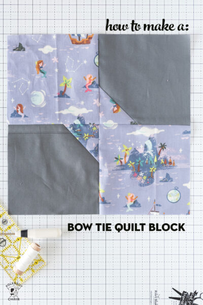 gray and purple quilt block on white cutting mat