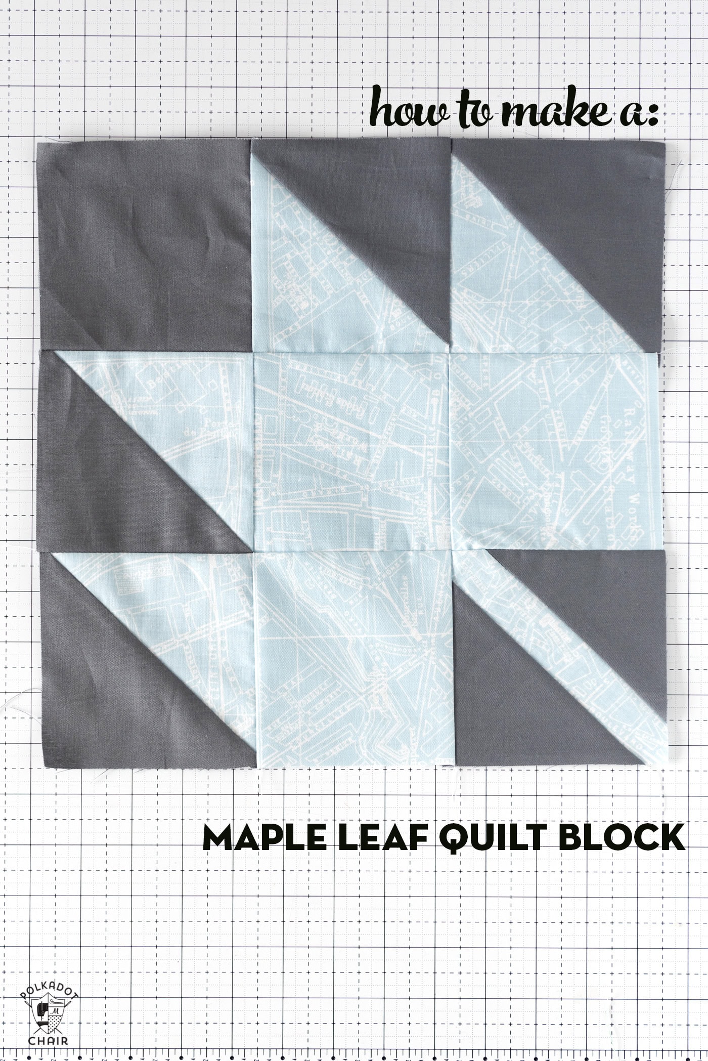 gray and blue maple leaf quilt block on white cutting mat