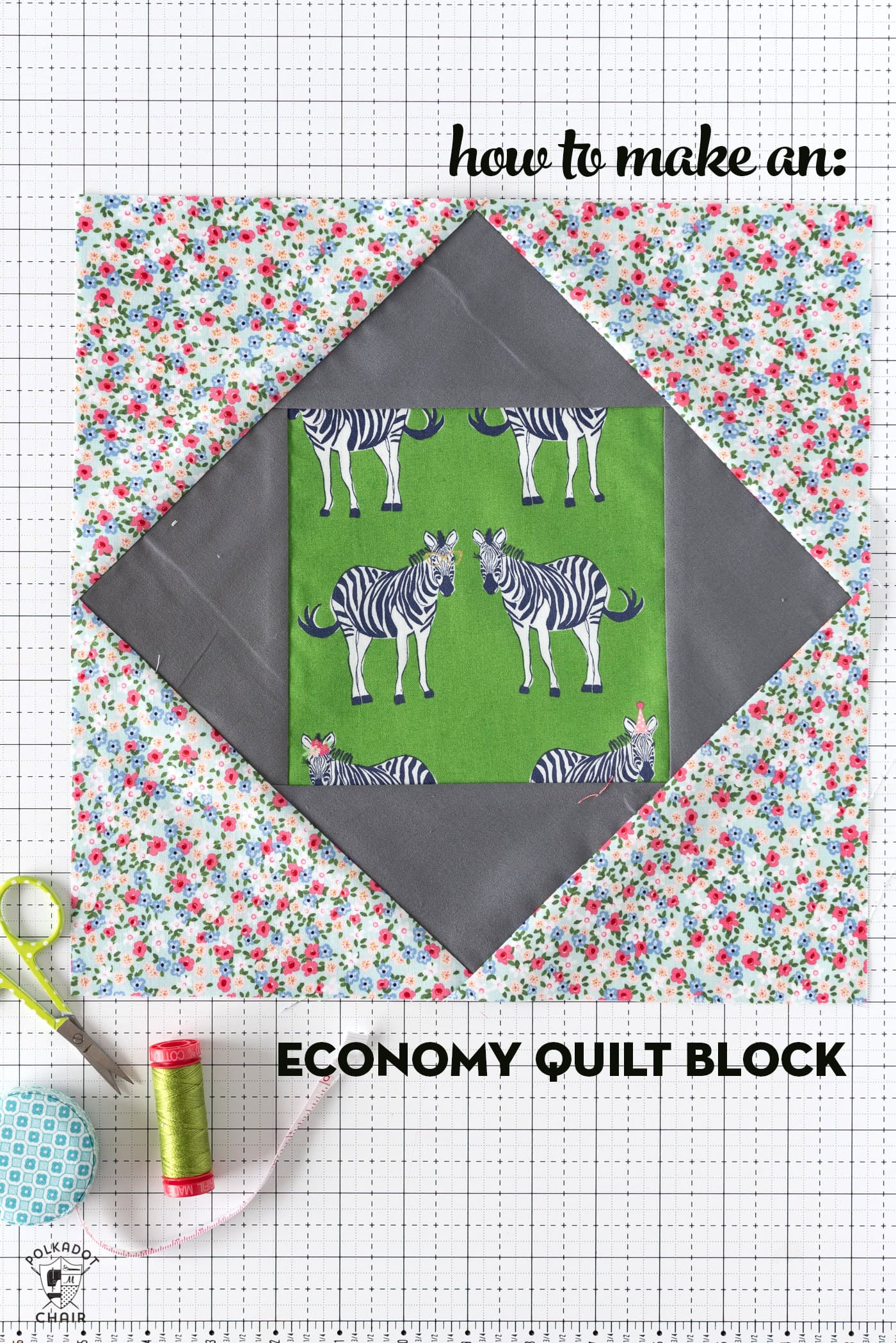 economy quilt block on white cutting mat with sewing notions